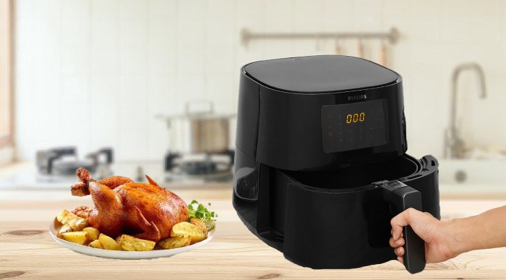 Bạn kéo nhẹ giỏ nồi chiên không dầu Philips HD9280/90 6.2 lít ra khỏi thiết bị để tránh làm trầy xước nồi Bạn kéo nhẹ giỏ nồi chiên không dầu Philips HD9280/90 6.2 lít ra khỏi thiết bị để tránh làm trầy xước nồi